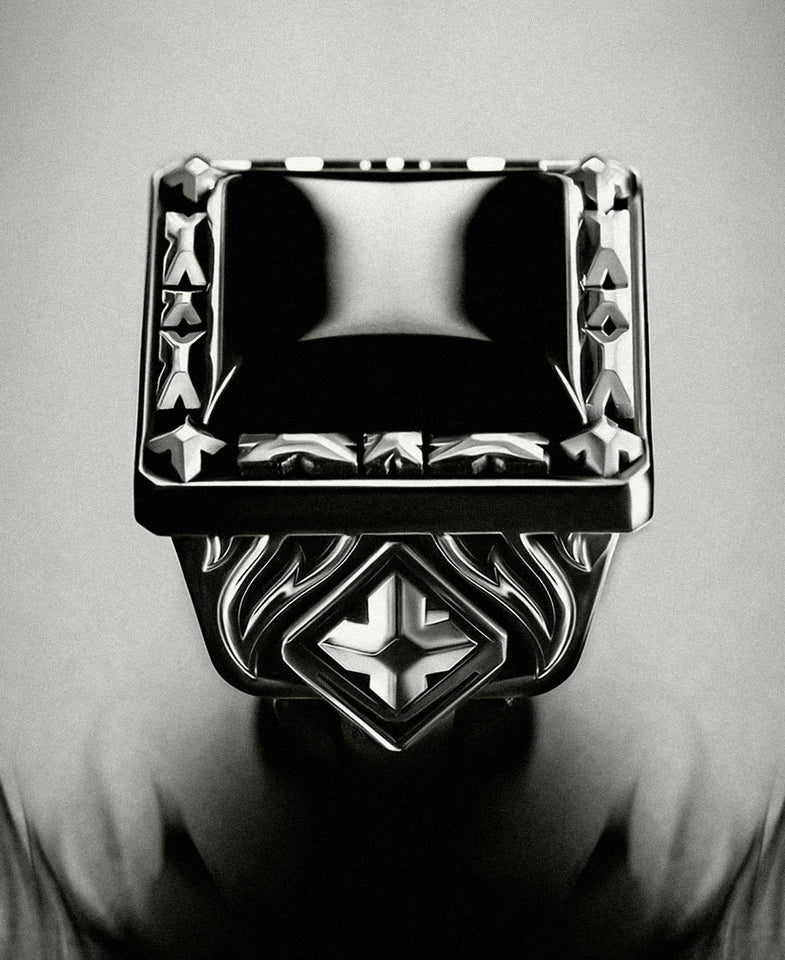 black and white image of a black onyx ring